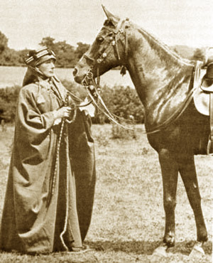 Lady Anne Blunt, in Bedouin attire, with her favourite riding mare, Kasida
